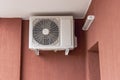 An air conditioning system installed outside on the wall of a brick building. Ventilation and air conditioning of housing Royalty Free Stock Photo