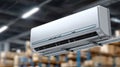 Air conditioning systems are mounted on the ceiling of a large industrial facility, enhancing airflow and climate control Royalty Free Stock Photo