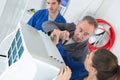 air conditioning technician and apprentices Royalty Free Stock Photo