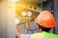 Air Conditioning Technician and A part of preparing to install n Royalty Free Stock Photo