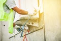 Air Conditioning Technician and A part of preparing to install n Royalty Free Stock Photo