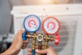 Technician is checking air conditioner Royalty Free Stock Photo