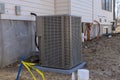 Air conditioning technician to install new air conditioner refueling the air conditioner with freon Royalty Free Stock Photo