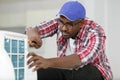air conditioning technician at work Royalty Free Stock Photo