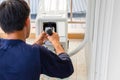 Air conditioning technicians install new air conditioners in homes, Repairman fix air conditioning systems, Male technician