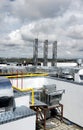 air conditioning unit and pipes on a roof Royalty Free Stock Photo