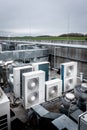 Air conditioning units on roof with other parts of ventilation system Royalty Free Stock Photo