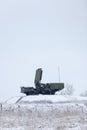 Air defense raider of military mobile anti-aircraft complex stands on a hill at winter season, Russia Royalty Free Stock Photo