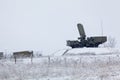 Air defense raider of military mobile anti-aircraft complex stands on a hill at winter season, Russia Royalty Free Stock Photo