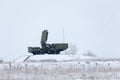 Air defense raider of military mobile anti-aircraft complex stands on a hill at winter season, Russia Royalty Free Stock Photo