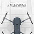 Air delivery. Drone flying over the city. City map on the background. Aerial Drone taking photography and video. Royalty Free Stock Photo