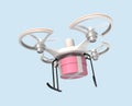 Air drone with gift package in the sky Royalty Free Stock Photo