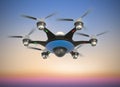 Air drone with surveillance camera flying in sunset sky. Royalty Free Stock Photo