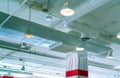 Air duct, air ventilation system in shopping mall building. Air conditioner pipe and plumbing pipe . Ceiling lamp light