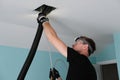 Air duct cleaning, drill, ductwork, man, hvac Royalty Free Stock Photo