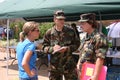 Air Force officer interviewed by military and civilian reporters.