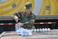 Air Force officer opens bottled water pack