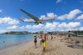 Airplane flying over Maho Beach, Sint Maarten, Dutch Caribbean