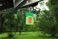 Air freshener hanging in car Royalty Free Stock Photo