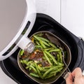 Air fryer meal, cooking green bean, pidan dishes cookery with Airfryer at home, delicious cuisine in Taiwan, Asia, Asian Taiwanese Royalty Free Stock Photo