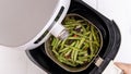 Air fryer meal, cooking green bean, pidan dishes cookery with Airfryer at home, delicious cuisine in Taiwan, Asia, Asian Taiwanese Royalty Free Stock Photo