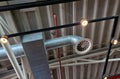 the air handling unit is on the ceiling of the building and is visibly left uncovered. Royalty Free Stock Photo