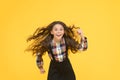 Air in her hair. natural beauty. Girl kid long hair flying in air. Child with natural beautiful healthy hair yellow