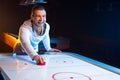 Air hockey game is fun even for adults