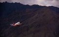 Air India indian passenger plane fly up from Leh airport surrounded by Himalaya mountain range