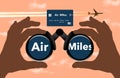 An air miles reward credit card is seen through binoculars