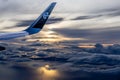 Air New Zealand Aircraft Wing in the sky at sunset