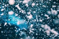 Air oxygen bubbles floating swimming up and boiling dark blue deep water forming different shapes some in focus blur coming up on Royalty Free Stock Photo