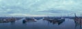 Air panorama the sunrise with cloudy sky under Remontova shipyard with ships in to dry docks. Gdansk, Poland Royalty Free Stock Photo