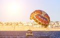Air parachute in the sky. Water parachute on three places. Parasailing. Summer active