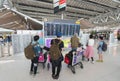 Air passengers watch timetable of departures in Bangkok airport