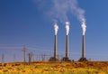 Air pollution from coal-powered plant smoke stacks Royalty Free Stock Photo