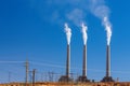 Air pollution from coal-powered plant smoke stacks Royalty Free Stock Photo