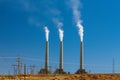 Air pollution from coal-powered plant smoke stacks Royalty Free Stock Photo