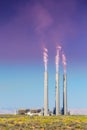 Air pollution from coal-powered plant smoke stacks Royalty Free Stock Photo