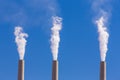 Air pollution from coal-powered plant smoke stacks Royalty Free Stock Photo