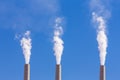 Air pollution from coal-powered plant smoke stacks Royalty Free Stock Photo