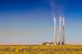 Air pollution from coal-powered plant smoke stacks Royalty Free Stock Photo