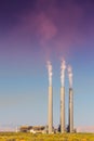 Air pollution from coal-powered plant smoke stacks Royalty Free Stock Photo