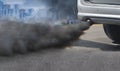air pollution crisis from diesel vehicle exhaust pipe on road