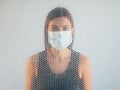 air pollution defocused portrait woman face mask