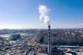 Air pollution, factory pipes, smoke from chimneys on sky background. Concept of industry, ecology, steam plant, heating season,