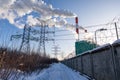 Air pollution from a natural gas and coal power plant. Emissions of harmful substances into the atmosphere. Traditional Royalty Free Stock Photo