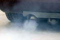 Air pollution and particulates caused by car exhaust gases Royalty Free Stock Photo