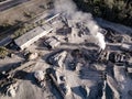 Air pollution by smoke coming out factory chimneys. Aerial Royalty Free Stock Photo