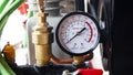 The air pressure gauge on the compressor machine Royalty Free Stock Photo